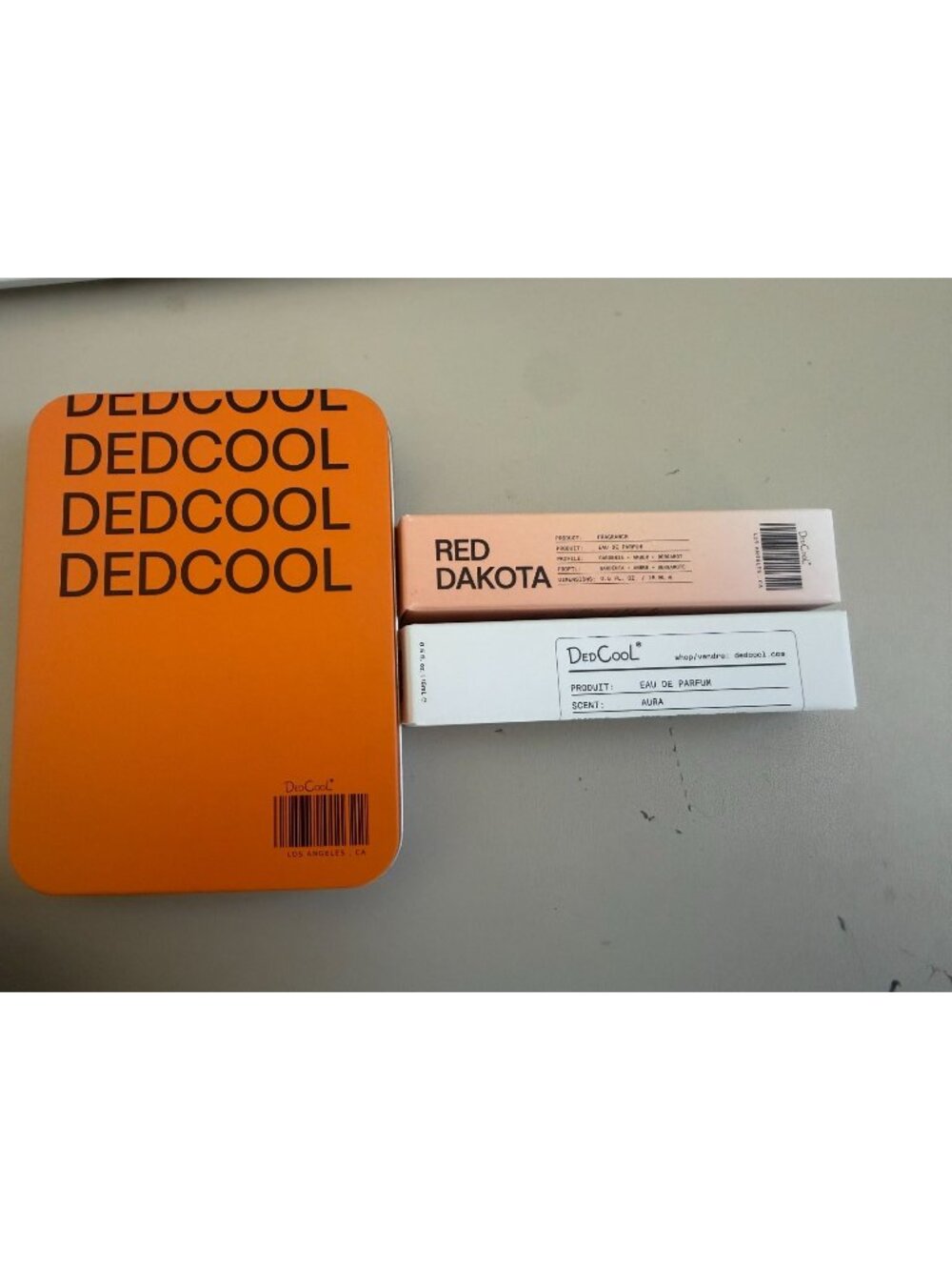 DEDCOOL SET OF 2 NEW IN BOX PERFUMES AURA AND RED DAKOTA PLUS COOL TIN/BOX